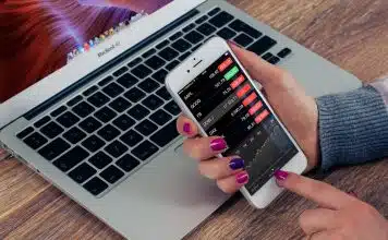 person holding silver iPhone 6